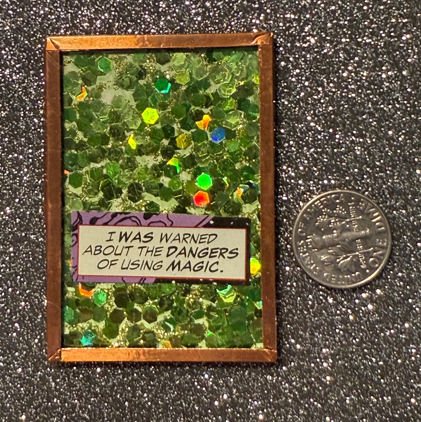 Green glitter "dangers of using magic" handmade magnet
